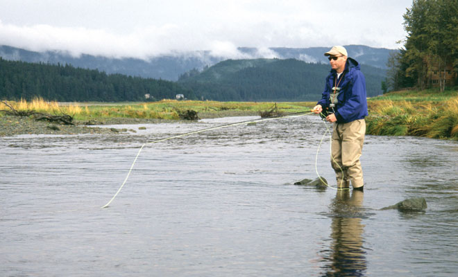 Chris Casey of Juneau, fly fishing in Fish Creek on Douglas Island not far from the Chinook imprint pond.