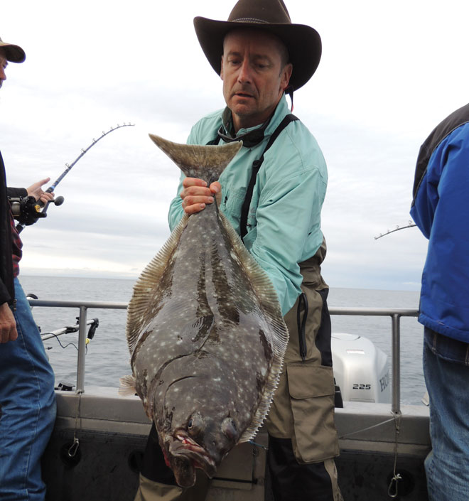 Regulations might require retained fish to conform to a slot limit. In this case, the fishermen could keep one longer than 30 inches and one shorter than 30 inches.