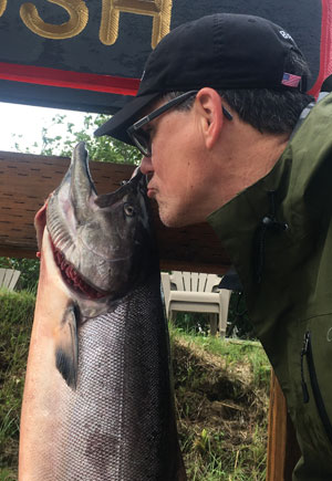 Kissing salmon at Nushagak River Adventures